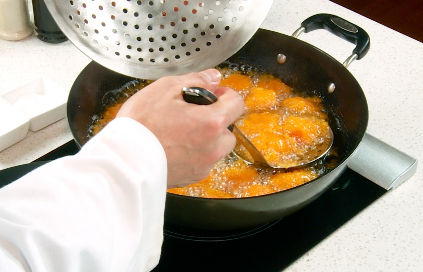 Fry until all the sweet potato balls float up