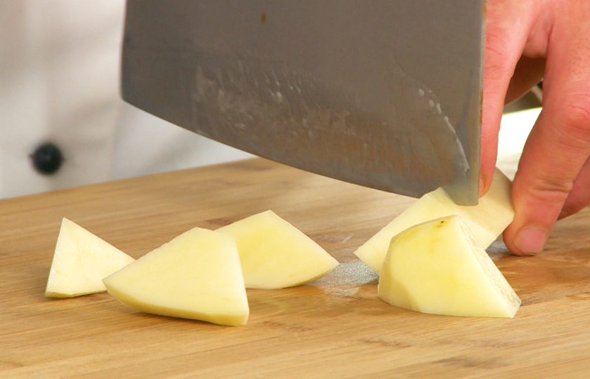 Cut potatoes into chunks