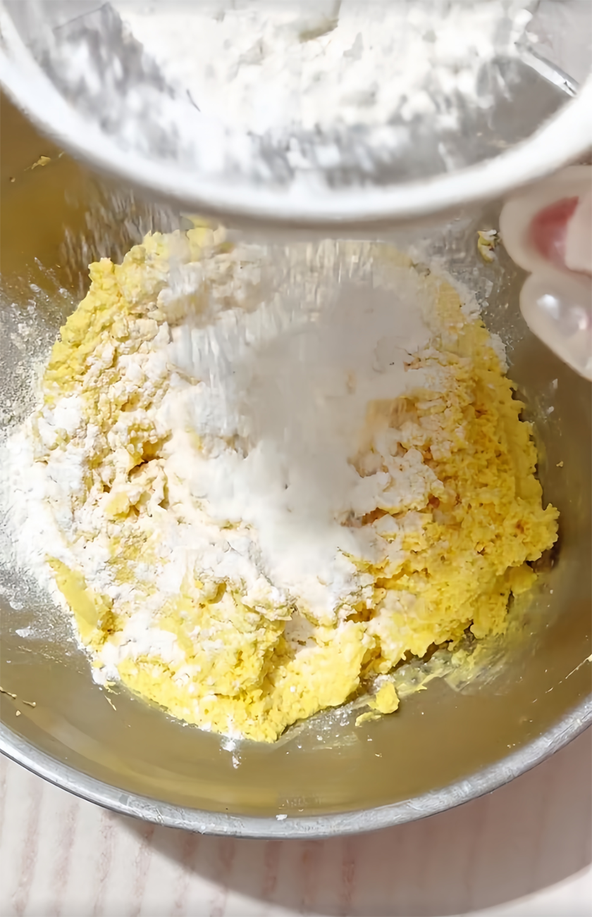 Sift in low-gluten flour and stir evenly