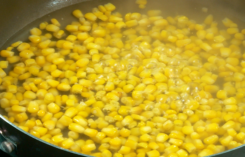 Blanch corn kernels