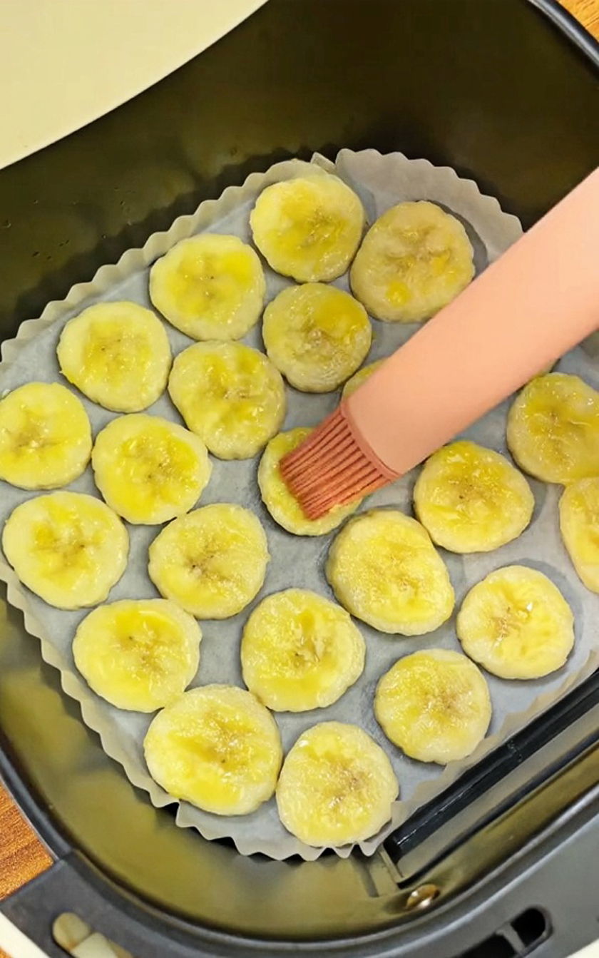 Brush banana slices with butter