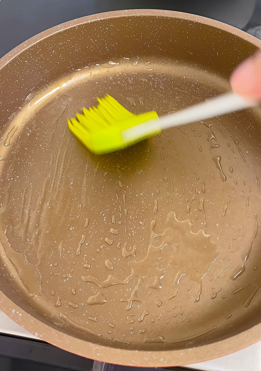 Brush a layer of oil on the pan